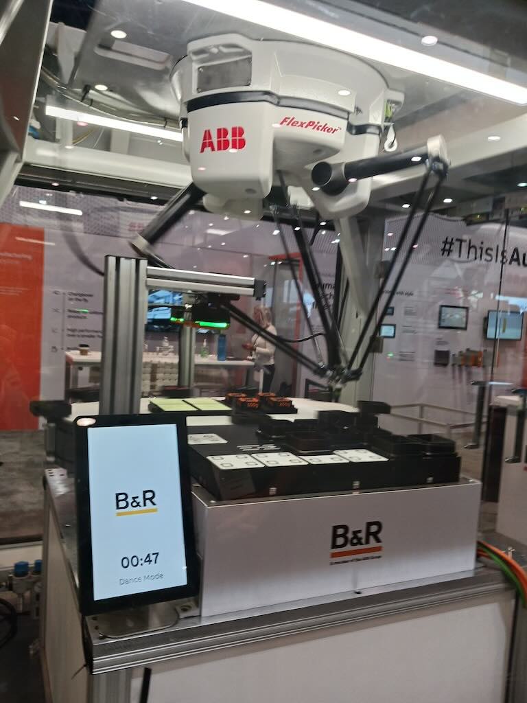 An ABB IRB 360 Flexpicker is integrated with a B&R AcoposTrak motion control (back) and Acopos 6D Transport Technology (front), which uses magnetic levitation to guide shuttles with integrated permanent magnets over the surface of electromagnetic motor segments. See related video. Courtesy: Mark T. Hoske, Control Engineering