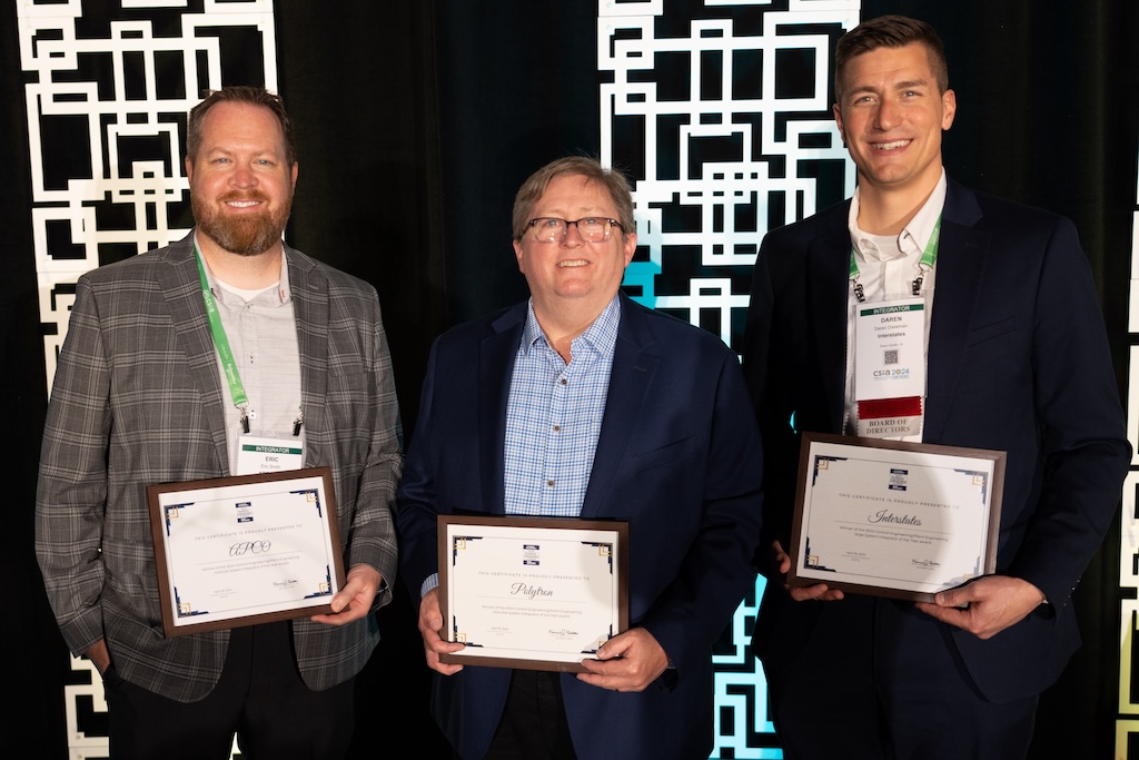 Accepting the 2024 System Integrator of the Year awards are (from left) Eric Smith, president, APCO; Ron Rich, CEO, Polytron; and Daren Dieleman, VP of operations, Interstates.